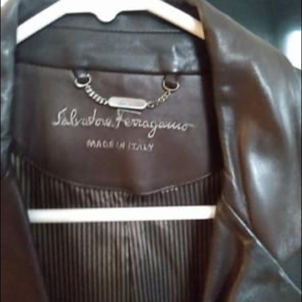 Salvatore Ferragamo suit coat. Used brown. Size 52. $400